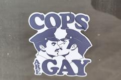Montemesola, adesivi provocatori con poliziotti che si baciano, «All Cops are Gay»: è polemica