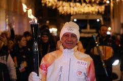 Igor Protti porta la Fiamma Olimpica a Livorno: un messaggio di speranza