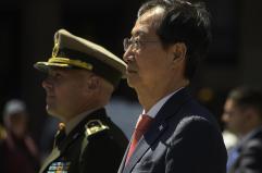 Seul, l'ex premier Han Duck-soo condannato a 23 anni per la legge marziale