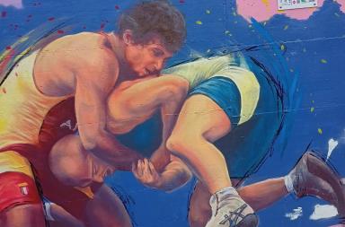 Bari, inaugurato il murale dedicato alla lotta greco-romana al giardino Morvillo