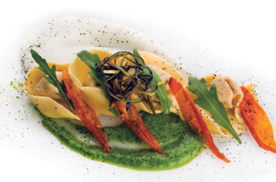 Tortelli di pasta fresca
con farcia di patate rosse
e cipolla su crema di fagioli
e olio aromatico alle olive