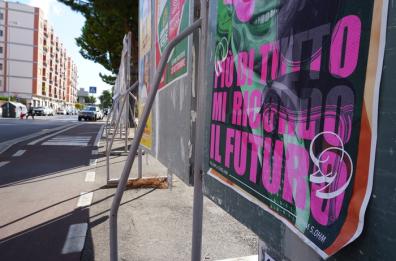 Manifesti a Bari: ecco un mix dei volti dei candidati su uno sfondo di Dalì