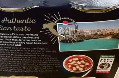 La bella Polignano sui pomodori pelati: simbolo della Puglia nel mondo
