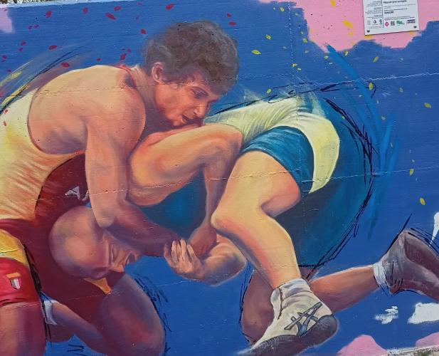 Bari, inaugurato il murale dedicato alla lotta greco-romana al giardino Morvillo