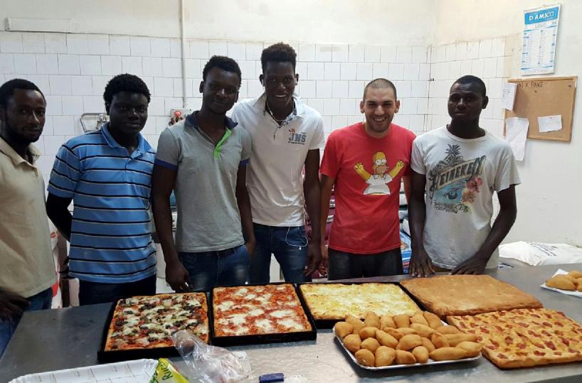migranti fanno il pane