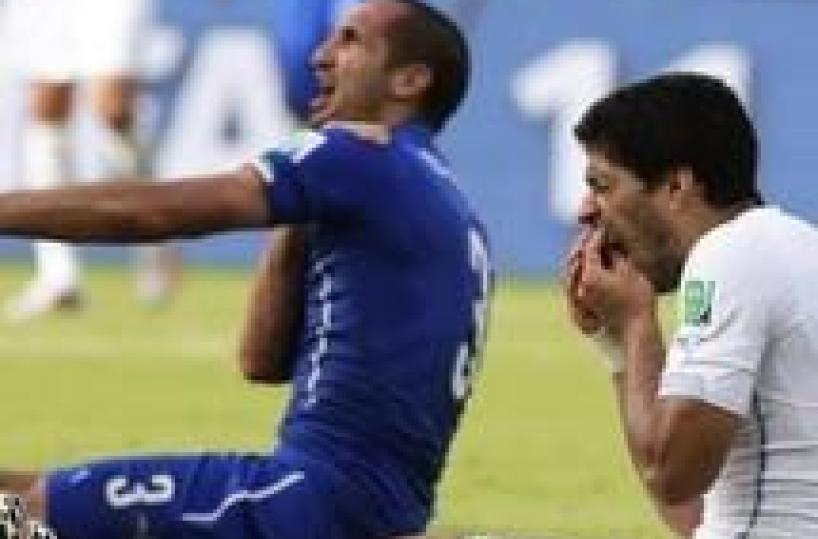Soccer: Bite-victim Chiellini says Suarez hit too hard