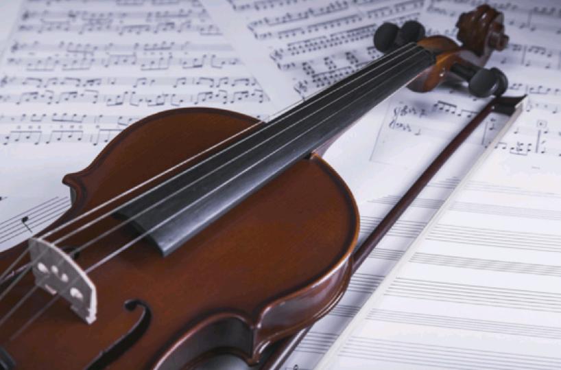 Violino con spartiti