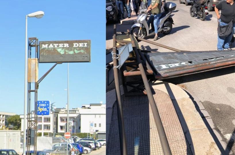 Tragedia sfiorata a Bari: crolla vecchia insegna del Mater Dei, ferita una donna con il figlio