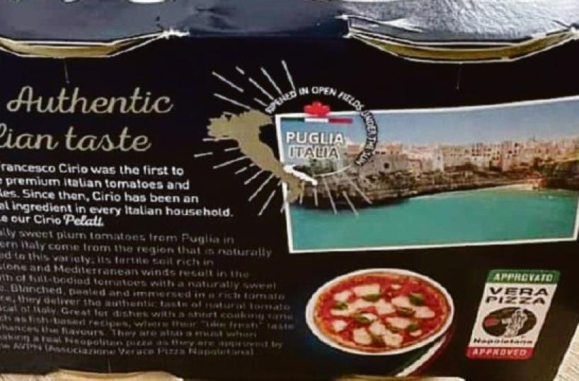 La bella Polignano sui pomodori pelati: simbolo della Puglia nel mondo